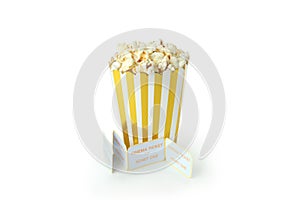 Paper box with popcorn, and tickets isolated on white background
