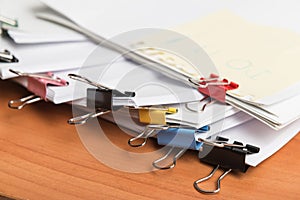 Paper business documents with color clips