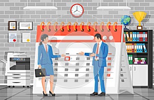 Paper calendar with businessman and businesswoman