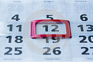 Paper calendar, different dates of the month, business planning photo