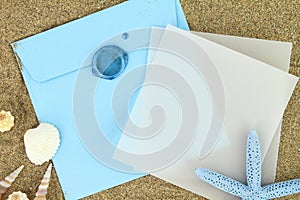 Paper card on the beach
