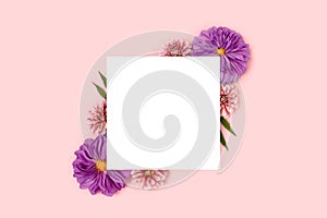 Paper card mockup with border frame made of dahlia flowers