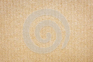 Paper cardboard background. Natural corrugated carton sheet. Kraft cardboard texture with vertical stripes