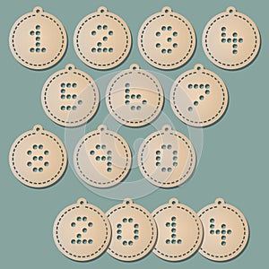 Paper christmas balls with puched numbers