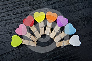 Paper clips with heart shape arranged on the table