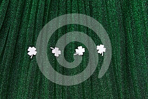 Paper clover St. Patrick`s day on green sparkle background