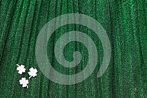 Paper clover St. Patrick`s day on green sparkle background