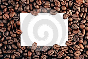 Paper on coffee bean background concept copy space