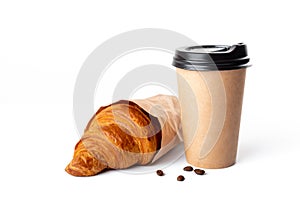 Craft coffee cup with croissant on white background