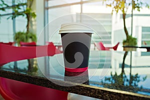 Paper coffee cup mock up template over modern background