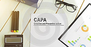 Paper with Corrective and Preventive CAPA action photo