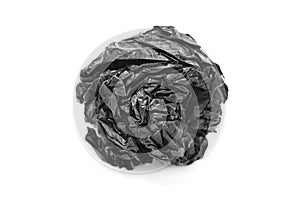 Paper. Crumpled ball of black paper on a white background