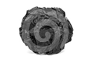 Paper. Crumpled ball of black paper on a white background