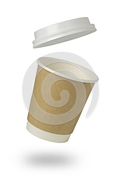 Paper cup of coffee floating