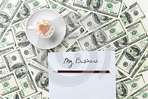 Paper and cup lying on the table