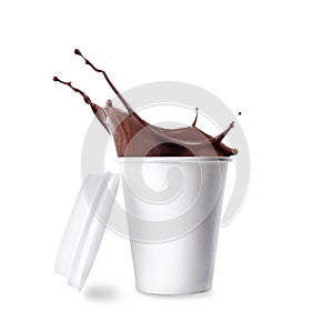 Paper cup with splashing hot chocolate