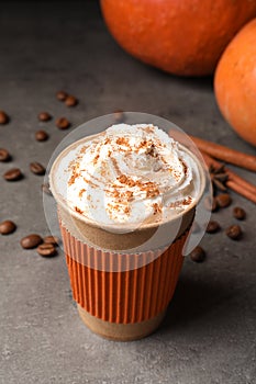 Paper cup with tasty pumpkin spice latte