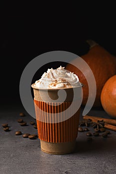 Paper cup with tasty pumpkin spice latte