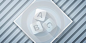 Paper cut ABC blocks icon isolated on grey background. Alphabet cubes with letters A,B,C. Paper art style. Vector