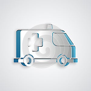 Paper cut Ambulance and emergency car icon isolated on grey background. Ambulance vehicle medical evacuation. Paper art