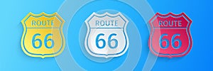 Paper cut American road icon isolated on blue background. Route sixty six road sign. Paper art style. Vector