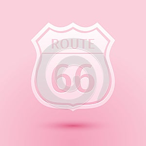 Paper cut American road icon isolated on pink background. Route sixty six road sign. Paper art style. Vector