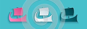 Paper cut Ancient Greek trireme icon isolated on blue background. Paper art style. Vector