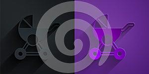 Paper cut Baby stroller icon isolated on black on purple background. Baby carriage, buggy, pram, stroller, wheel. Paper