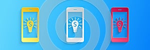 Paper cut Business light bulb with dollar on smartphone screen icon isolated on blue background. User touch screen