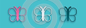 Paper cut Butterfly icon isolated on blue background. Paper art style. Vector