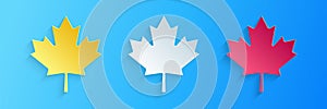Paper cut Canadian maple leaf icon isolated on blue background. Canada symbol maple leaf. Paper art style. Vector