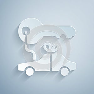 Paper cut Car gift icon isolated on grey background. Car key prize. Paper art style. Vector