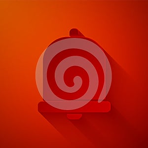 Paper cut Church bell icon isolated on red background. Alarm symbol, service bell, handbell sign, notification symbol