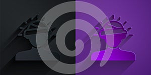 Paper cut Concussion, headache, dizziness, migraine icon isolated on black on purple background. Paper art style. Vector