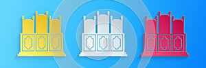 Paper cut Court`s room with table icon isolated on blue background. Chairs icon. Paper art style. Vector