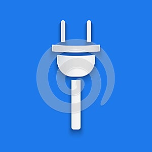 Paper cut Electric plug icon isolated on blue background. Concept of connection and disconnection of the electricity