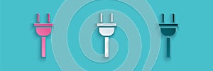 Paper cut Electric plug icon isolated on blue background. Concept of connection and disconnection of the electricity