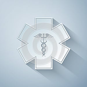 Paper cut Emergency star - medical symbol Caduceus snake with stick icon isolated on grey background. Star of Life