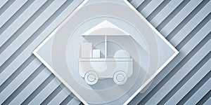 Paper cut Fast street food cart icon isolated on grey background. Urban kiosk. Paper art style. Vector Illustration