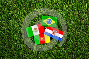 Paper cut of flags for Soccer championship 2014 , group A