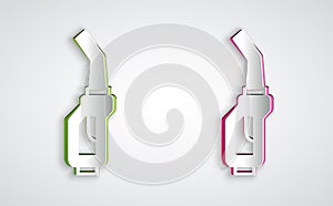 Paper cut Gasoline pump nozzle icon isolated on grey background. Fuel pump petrol station. Refuel service sign. Gas