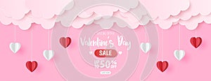 Paper cut of Happy Valentine`s Day sale background with red and white heart with cloud on pink background for greeting card,