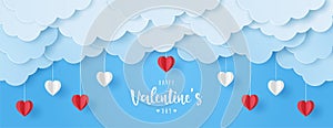 Paper cut of Happy Valentine`s Day text with red and white heart, cloud on blue sky background for greeting card, banner and