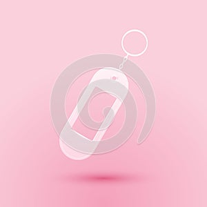 Paper cut Key chain icon isolated on pink background. Blank rectangular keychain with ring and chain for key. Paper art