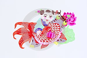 Paper-cut of kid and fish
