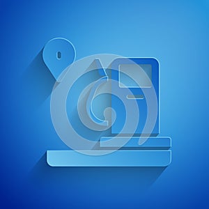 Paper cut Location and petrol or gas station icon isolated on blue background. Car fuel symbol. Gasoline pump. Paper art