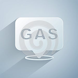 Paper cut Location and petrol or gas station icon isolated on grey background. Car fuel symbol. Gasoline pump. Paper art