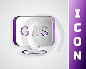 Paper cut Location and petrol or gas station icon isolated on grey background. Car fuel symbol. Gasoline pump. Paper art