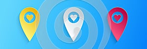 Paper cut Map pointer with heart icon isolated on blue background. Valentines day. Love location. Romantic map pin