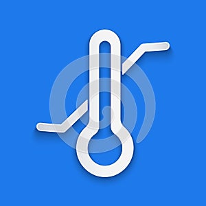 Paper cut Meteorology thermometer measuring icon isolated on blue background. Thermometer equipment showing hot or cold